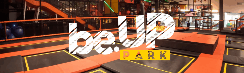 Indoor trampoline zone at be.UP Park Cresta, featuring colorful trampolines and a safe, fun environment for family activities.