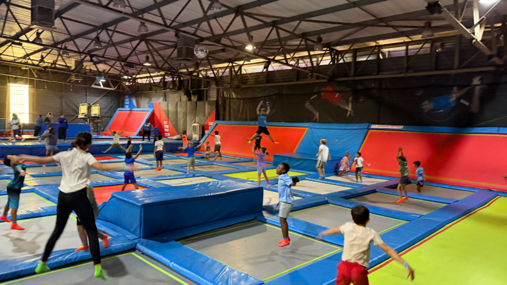 Kids jumping on trampolines at Rush Claremont, an active indoor winter activity for families in Cape Town.