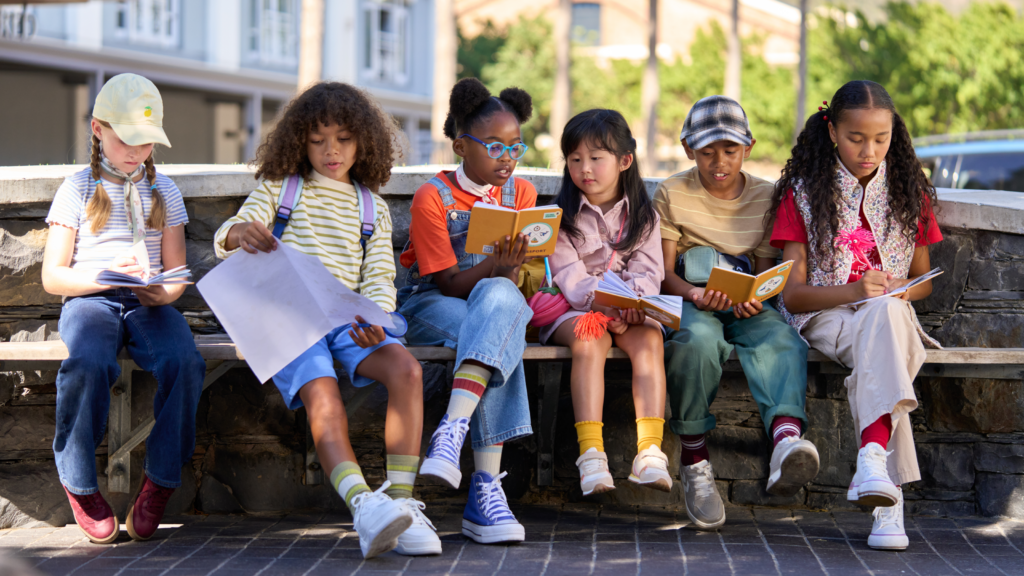 Children using explorer passports during a family discovery activity at V & A Waterfront in Cape Town