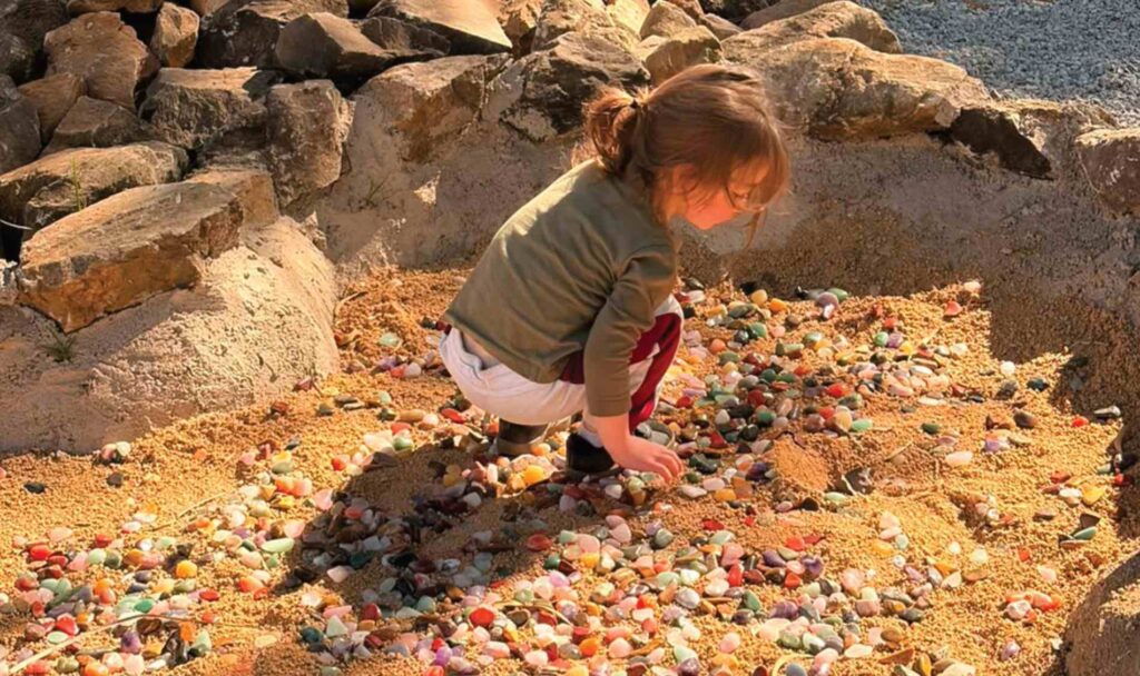 Child enjoying a gemstone activity for kids in Edenvale